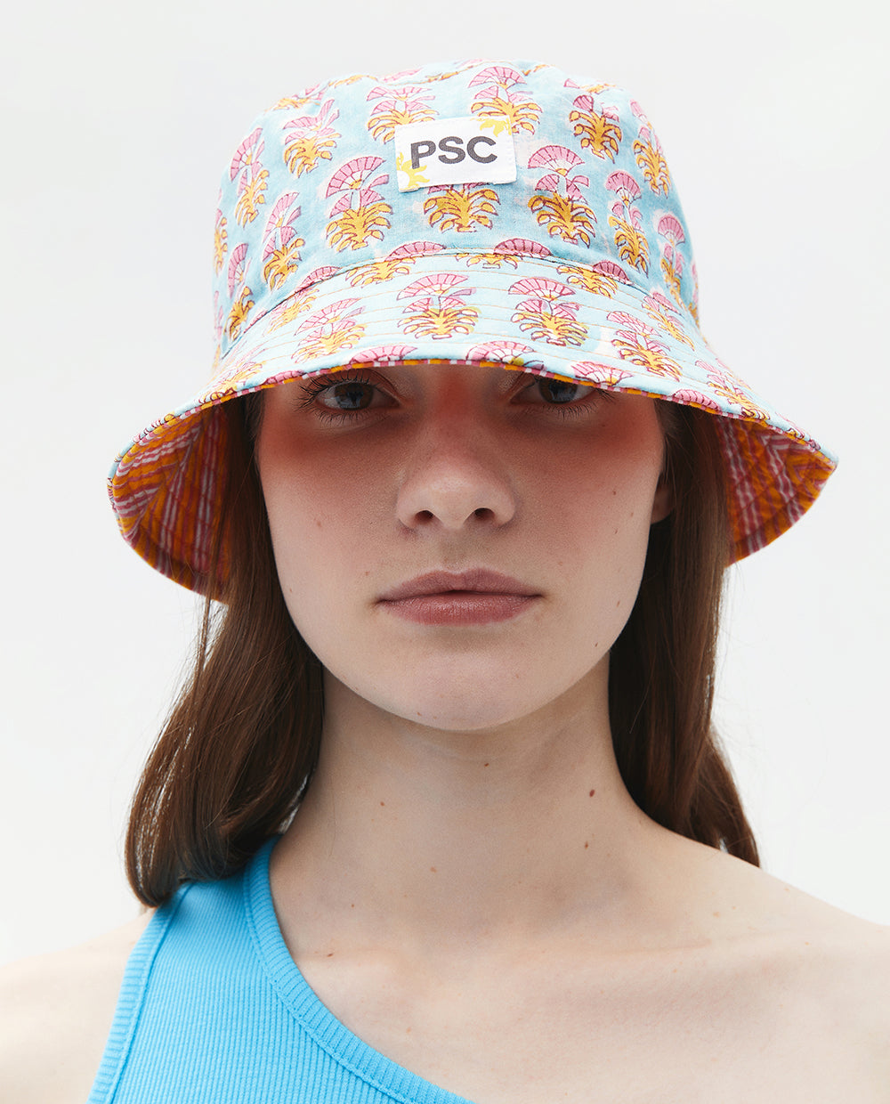 REVERSIBLE BUCKET HAT